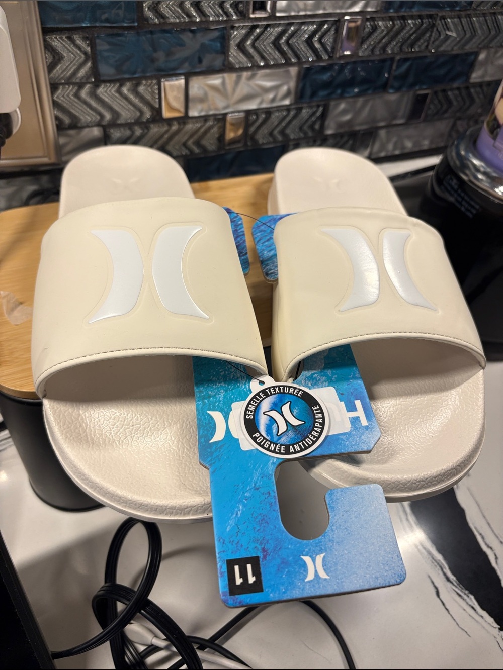 Hurley Cream Slide Sandals with White Logo Accent